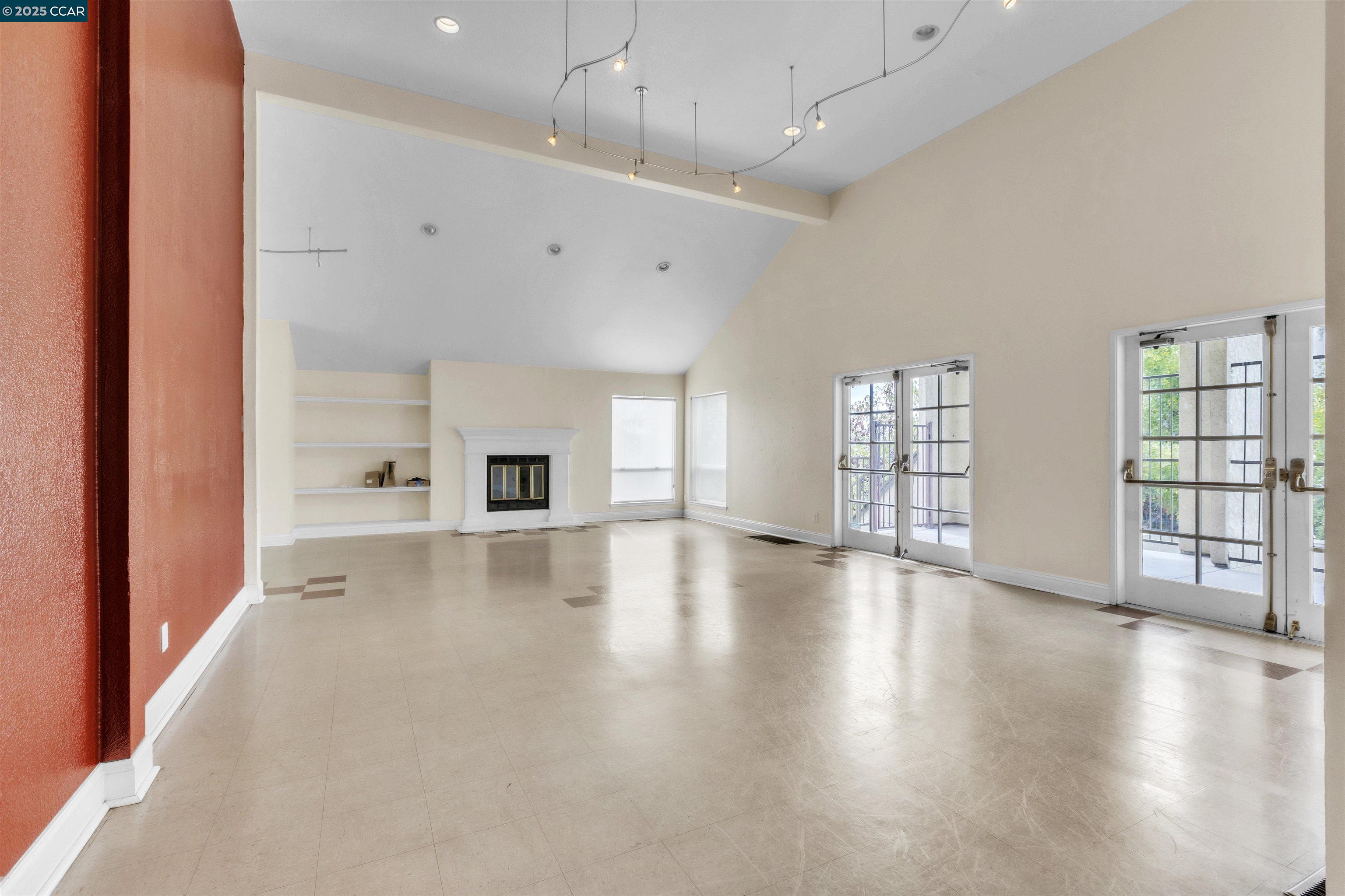 29583 Vanderbilt Street, Unit 310 Hayward, CA 94544 - Photo 18 of 22 an empty room with wooden floor and windows