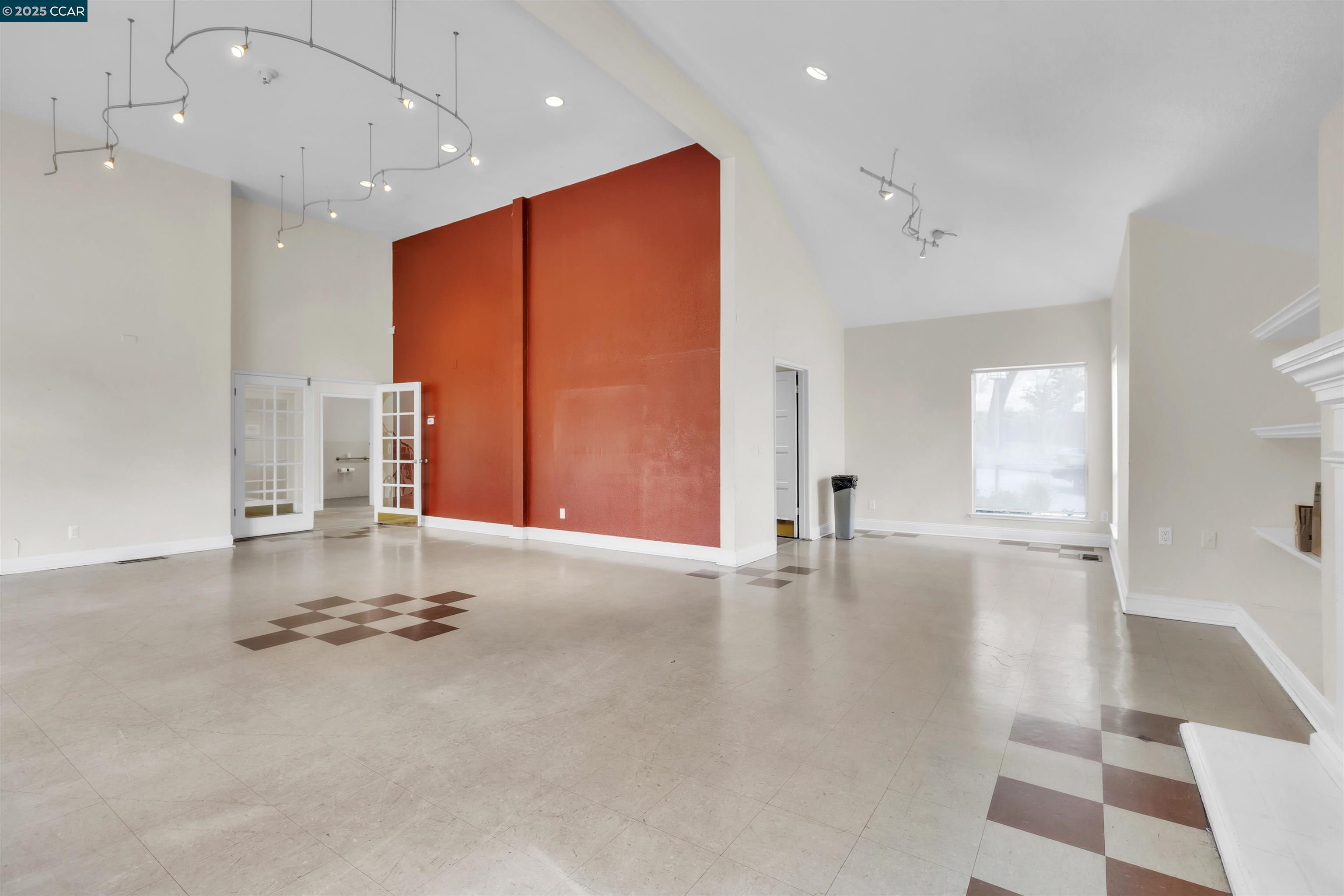 29583 Vanderbilt Street, Unit 310 Hayward, CA 94544 - Photo 19 of 22 an empty room with wooden floor and windows