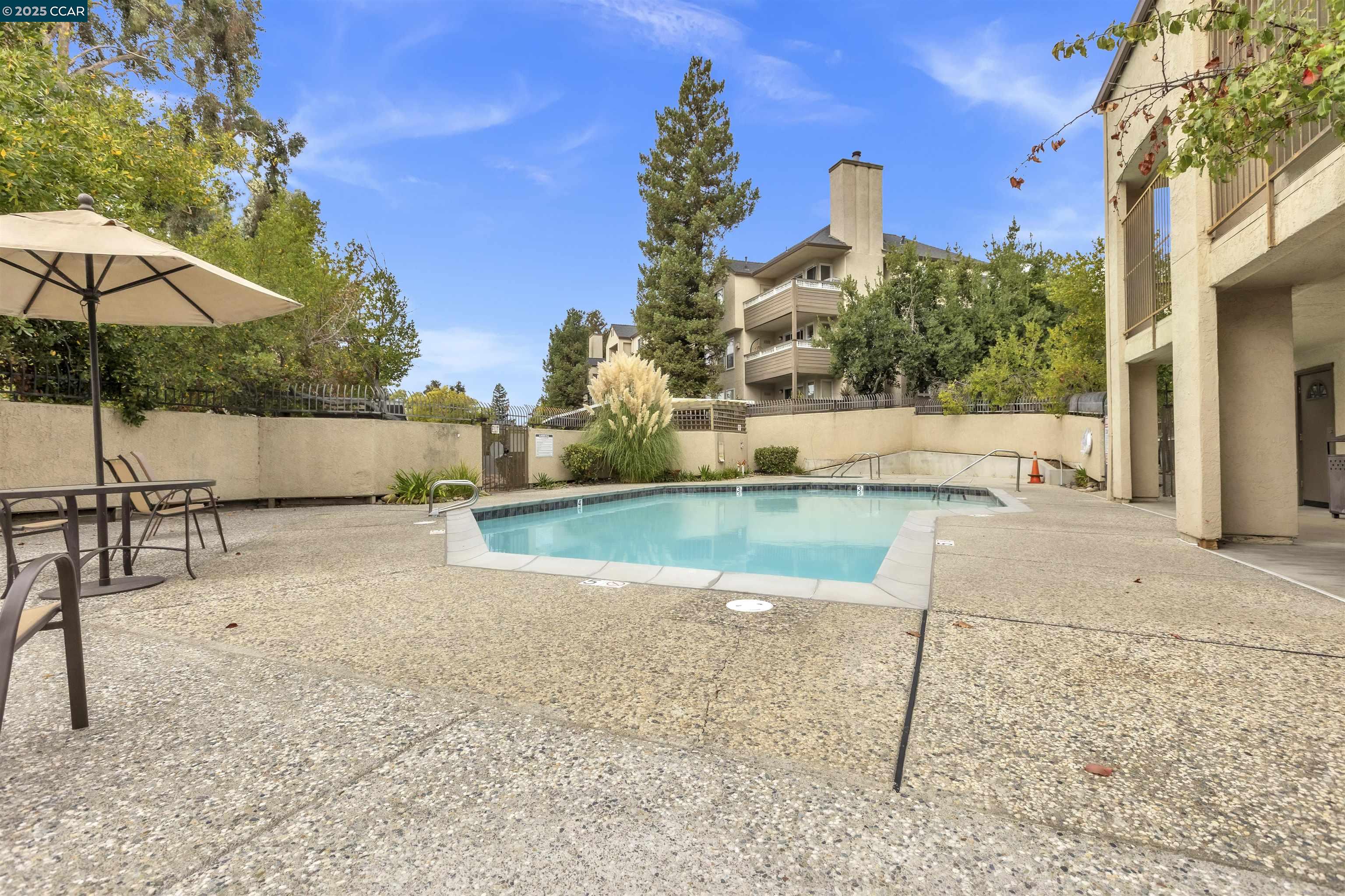 29583 Vanderbilt Street, Unit 310 Hayward, CA 94544 - Photo 21 of 22 a view of a house with backyard and sitting area