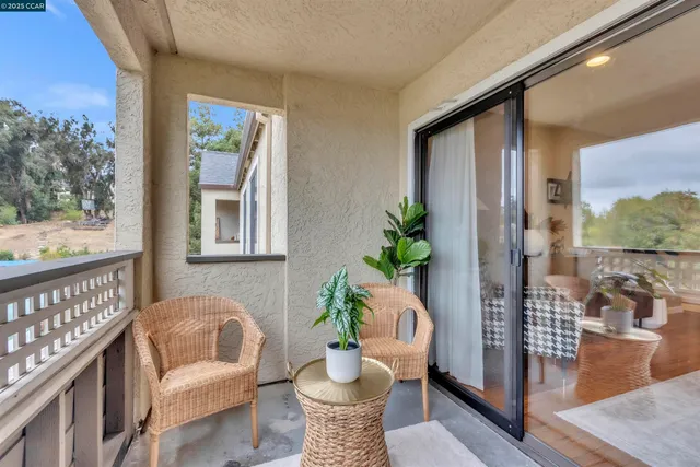 a view of a porch with furniture