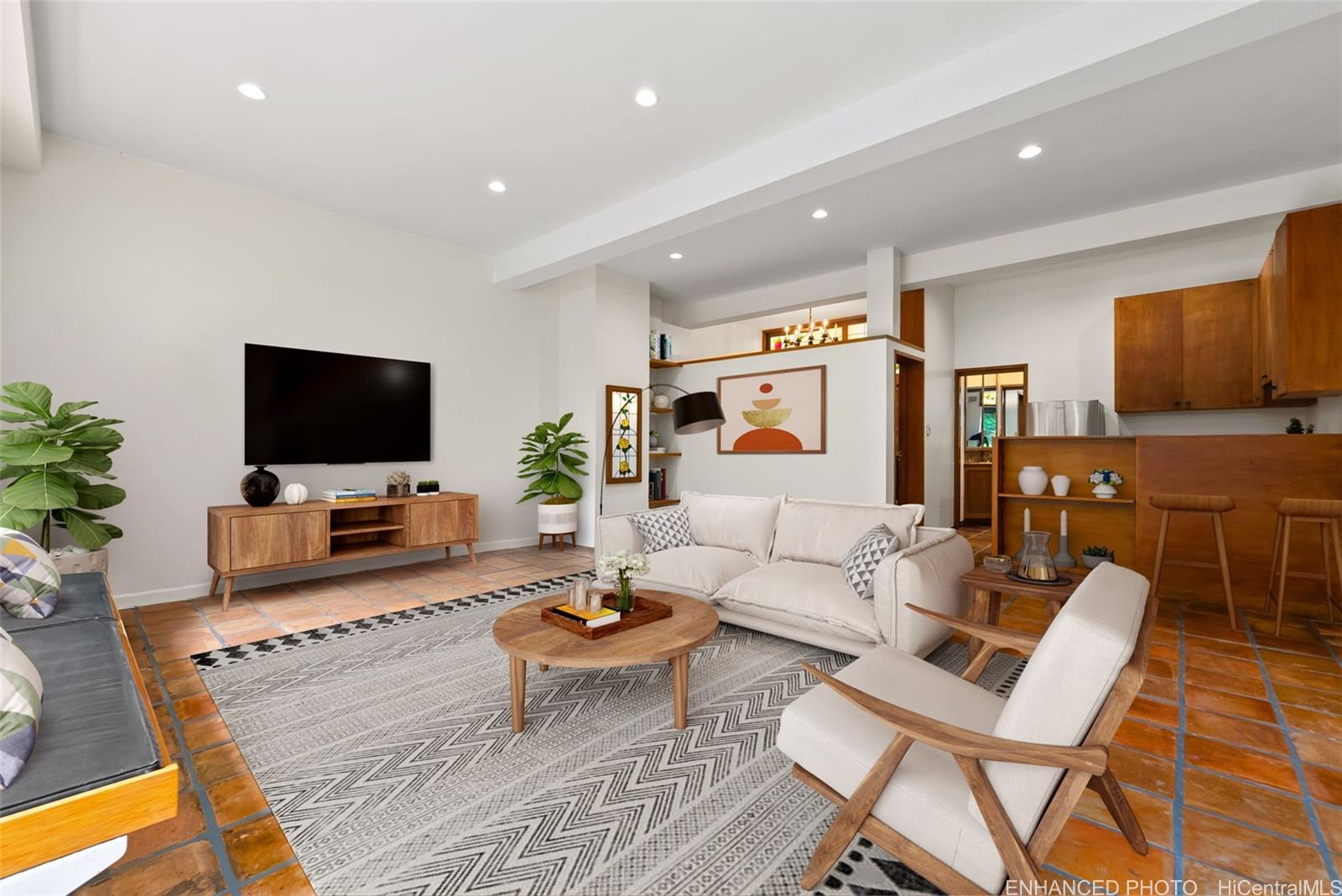 156 Forest Ridge Way Honolulu, HI 96822 - Photo 11 of 25 a living room with furniture and a flat screen tv