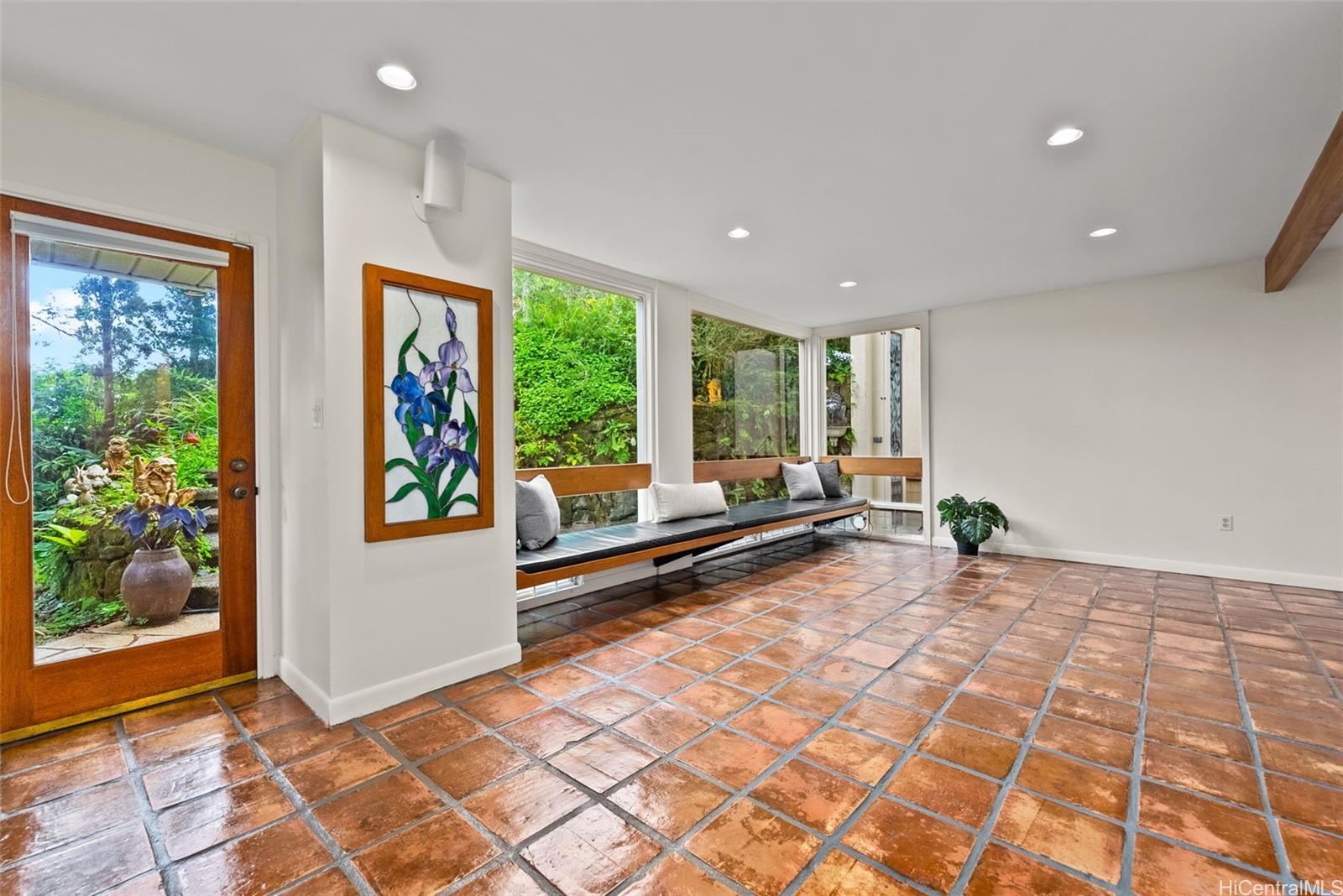 156 Forest Ridge Way Honolulu, HI 96822 - Photo 19 of 25 a very nice looking room with a large window