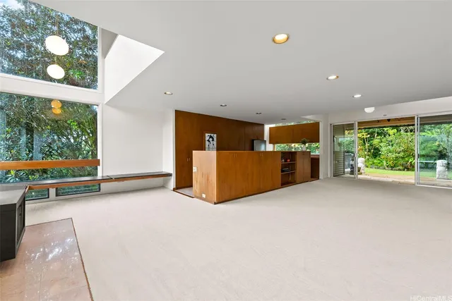 a view of livingroom with furniture and windows