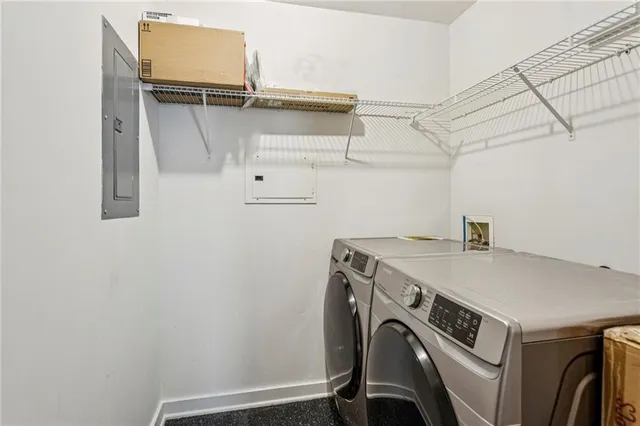 a utility room with dryer and washer