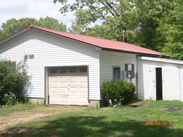 610 Beaverdam Road Camden, TN 38320 - Photo 3 of 15 a front view of a house with a yard