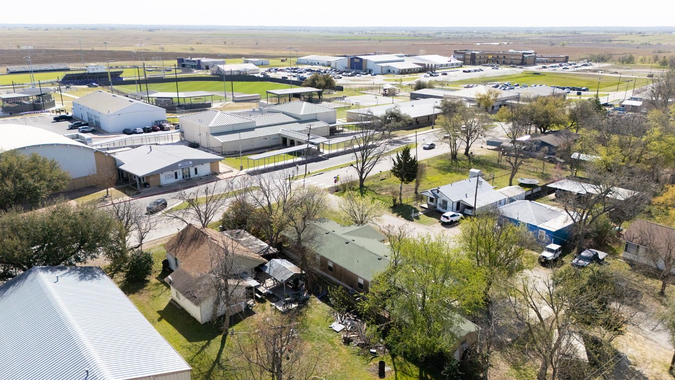 209 East Sheldon Avenue Thrall, TX 76578 - Photo 11 of 20 an aerial view of residential houses with outdoor space