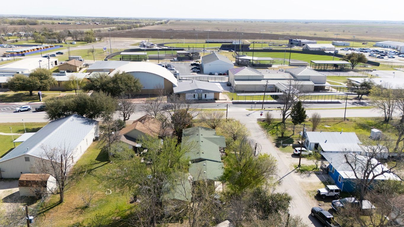 209 East Sheldon Avenue Thrall, TX 76578 - Photo 12 of 20 an aerial view of residential houses with outdoor space