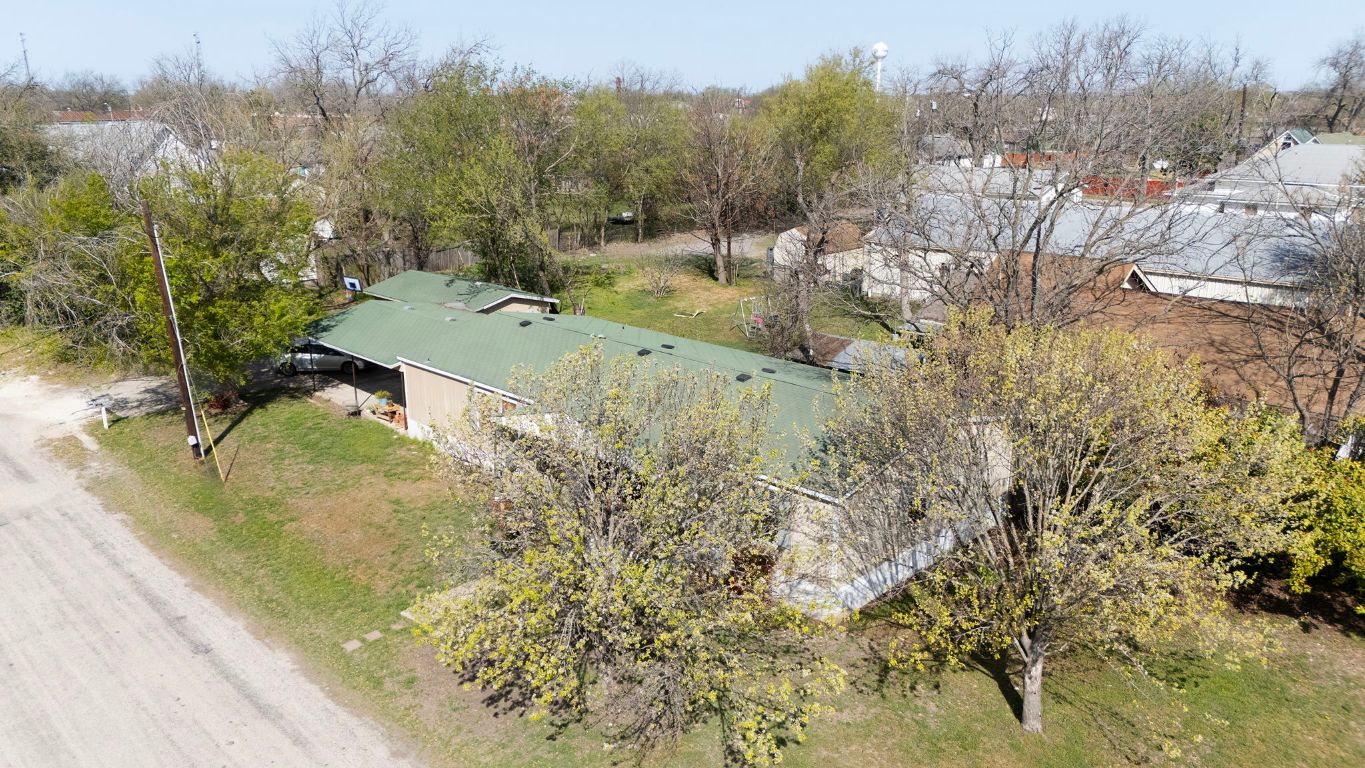 209 East Sheldon Avenue Thrall, TX 76578 - Photo 16 of 20 a view of a yard with large trees