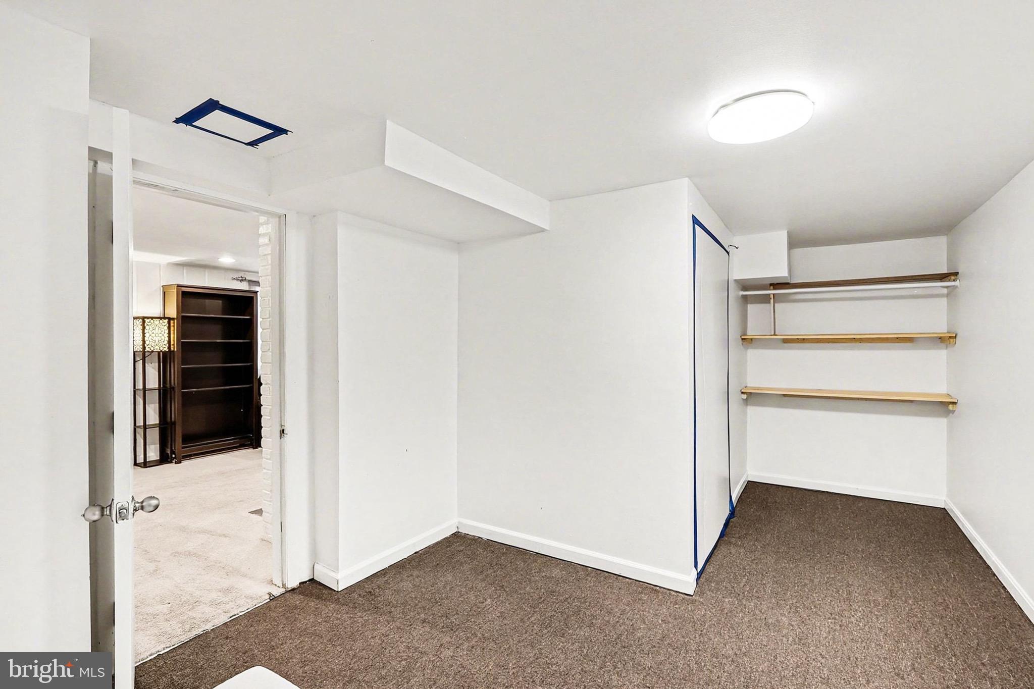 7112 Dalhouse Street Springfield, VA 22151 - Photo 20 of 25 a view of an empty room