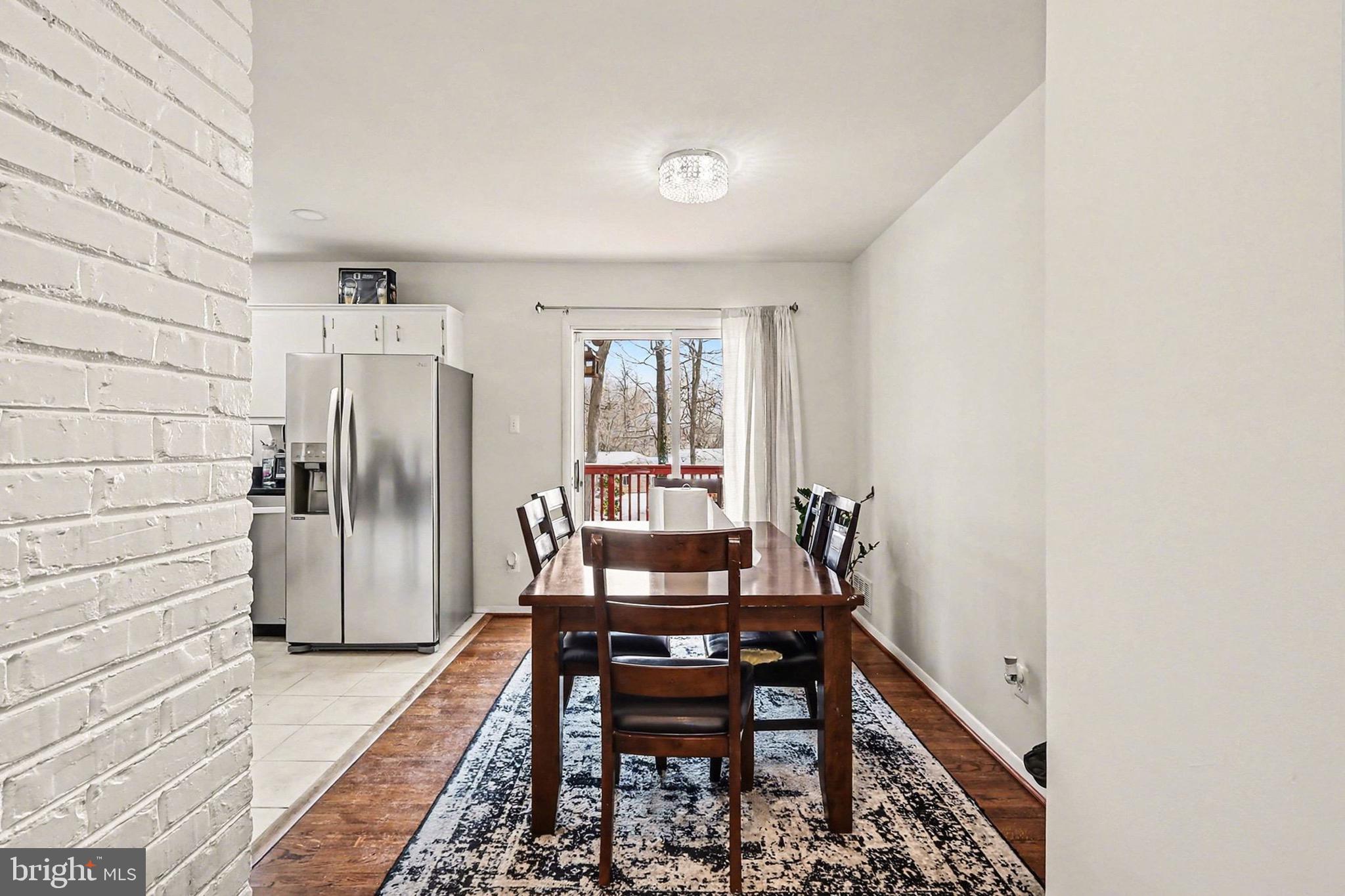 7112 Dalhouse Street Springfield, VA 22151 - Photo 4 of 25 a view of a hallway with seating area