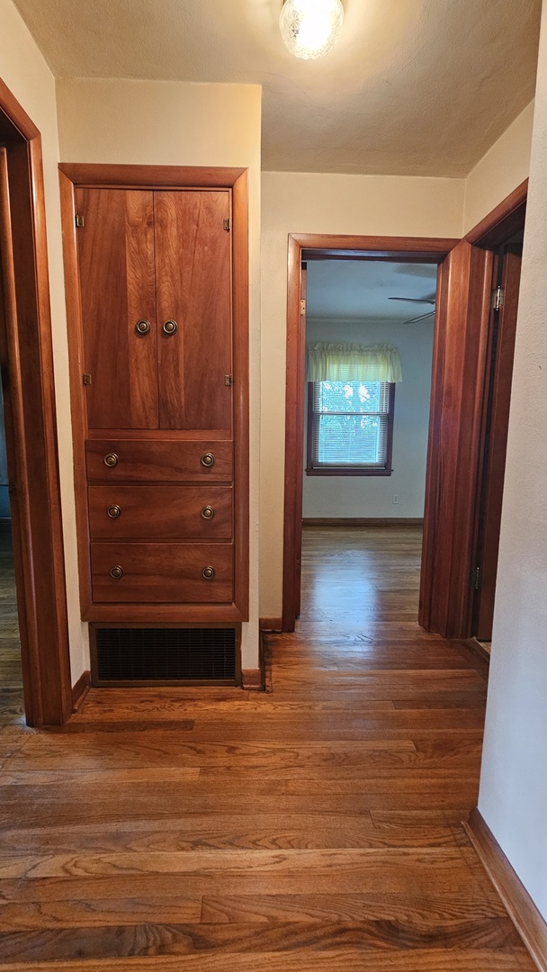 13658 East Flagg Road Rochelle, IL 61068 - Photo 14 of 65 a view of a room with wooden floor and stairs