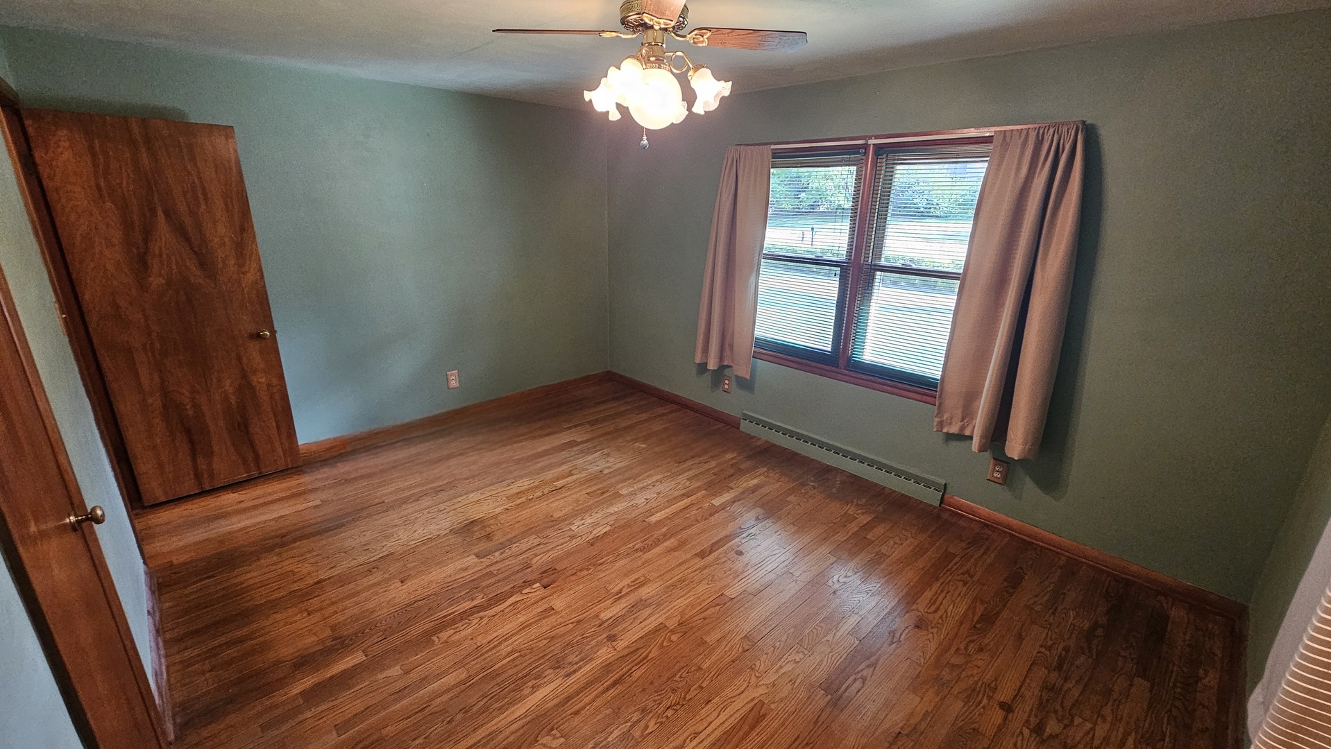 13658 East Flagg Road Rochelle, IL 61068 - Photo 18 of 65 wooden floor in an empty room with a window