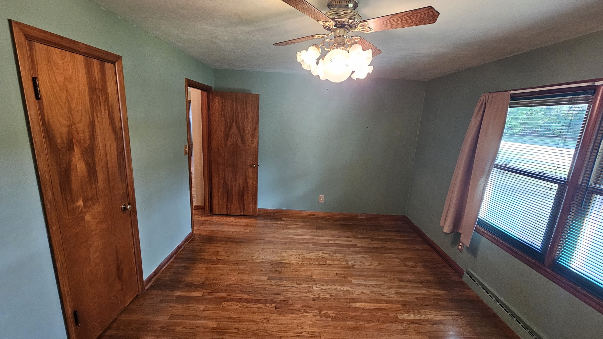 13658 East Flagg Road Rochelle, IL 61068 - Photo 20 of 65 wooden floor in an empty room with a window