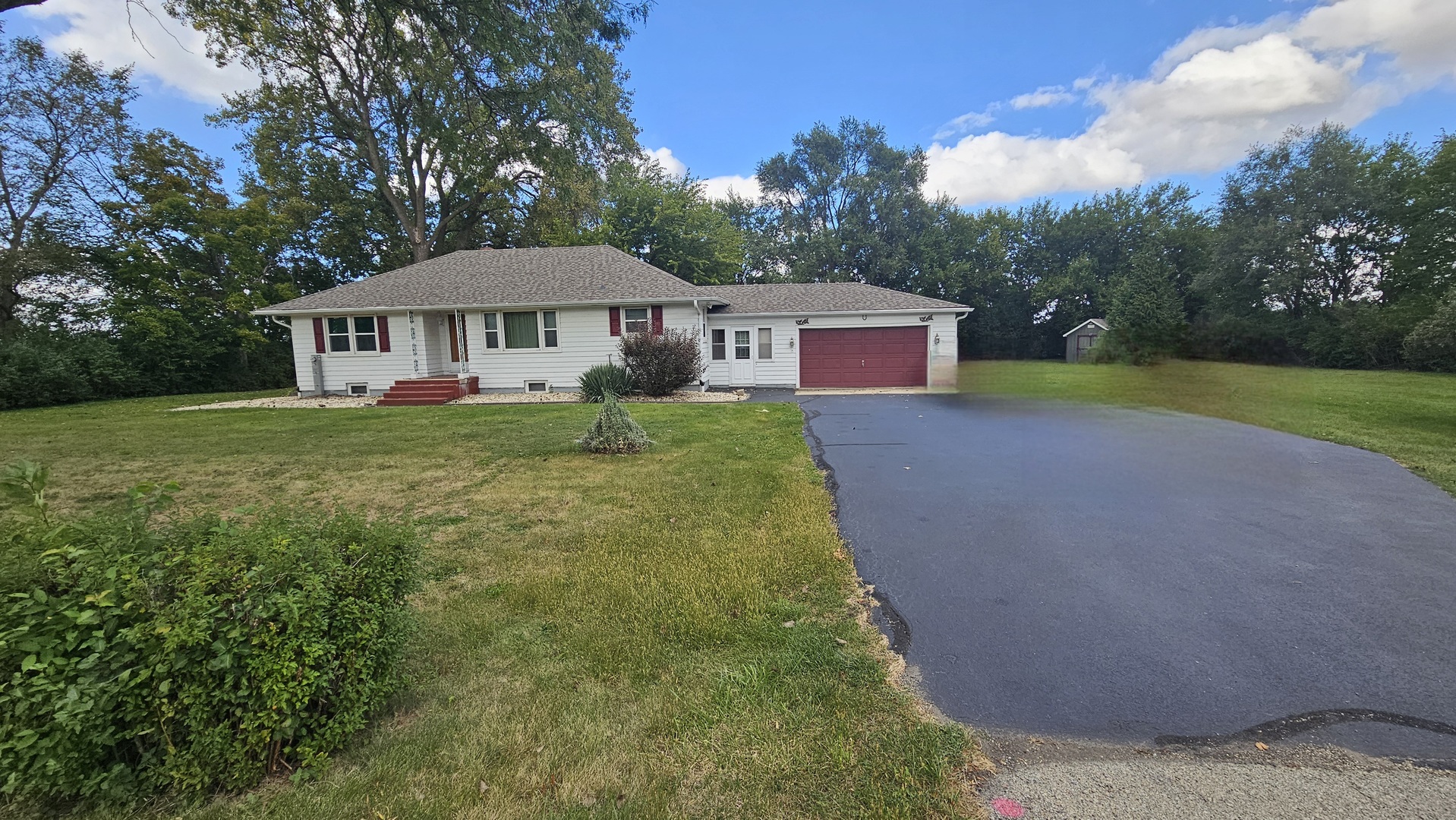 13658 East Flagg Road Rochelle, IL 61068 - Photo 2 of 65 a house with huge green field in front of it