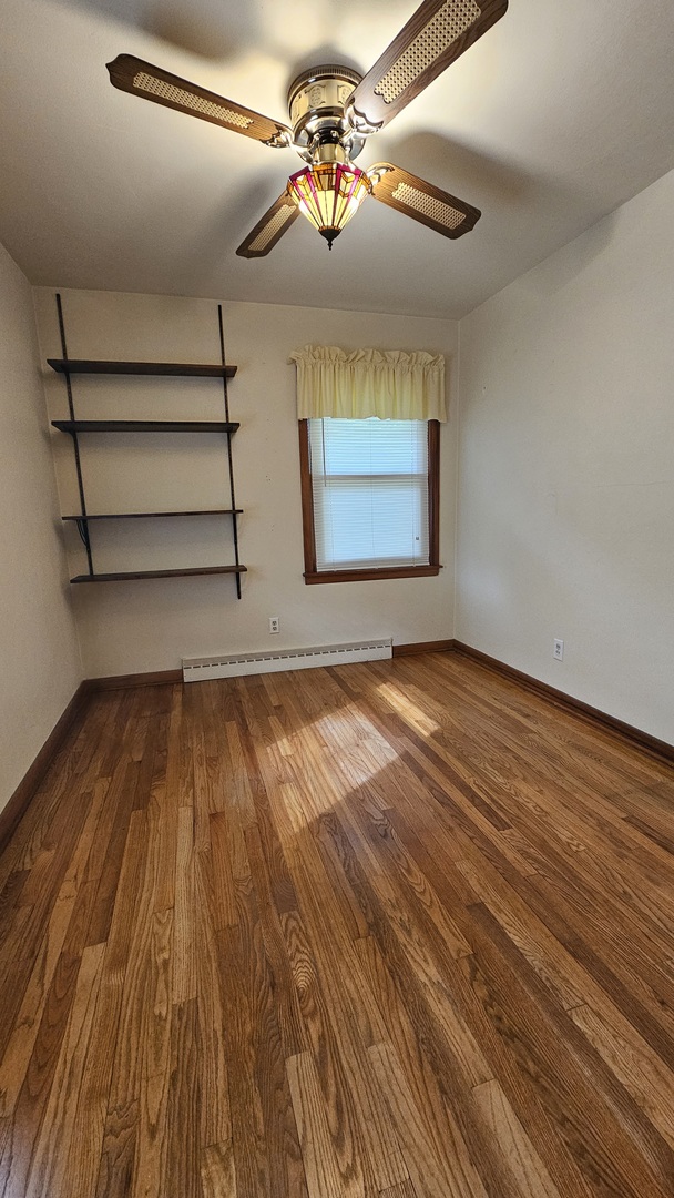 13658 East Flagg Road Rochelle, IL 61068 - Photo 23 of 65 a view of a room with wooden floor