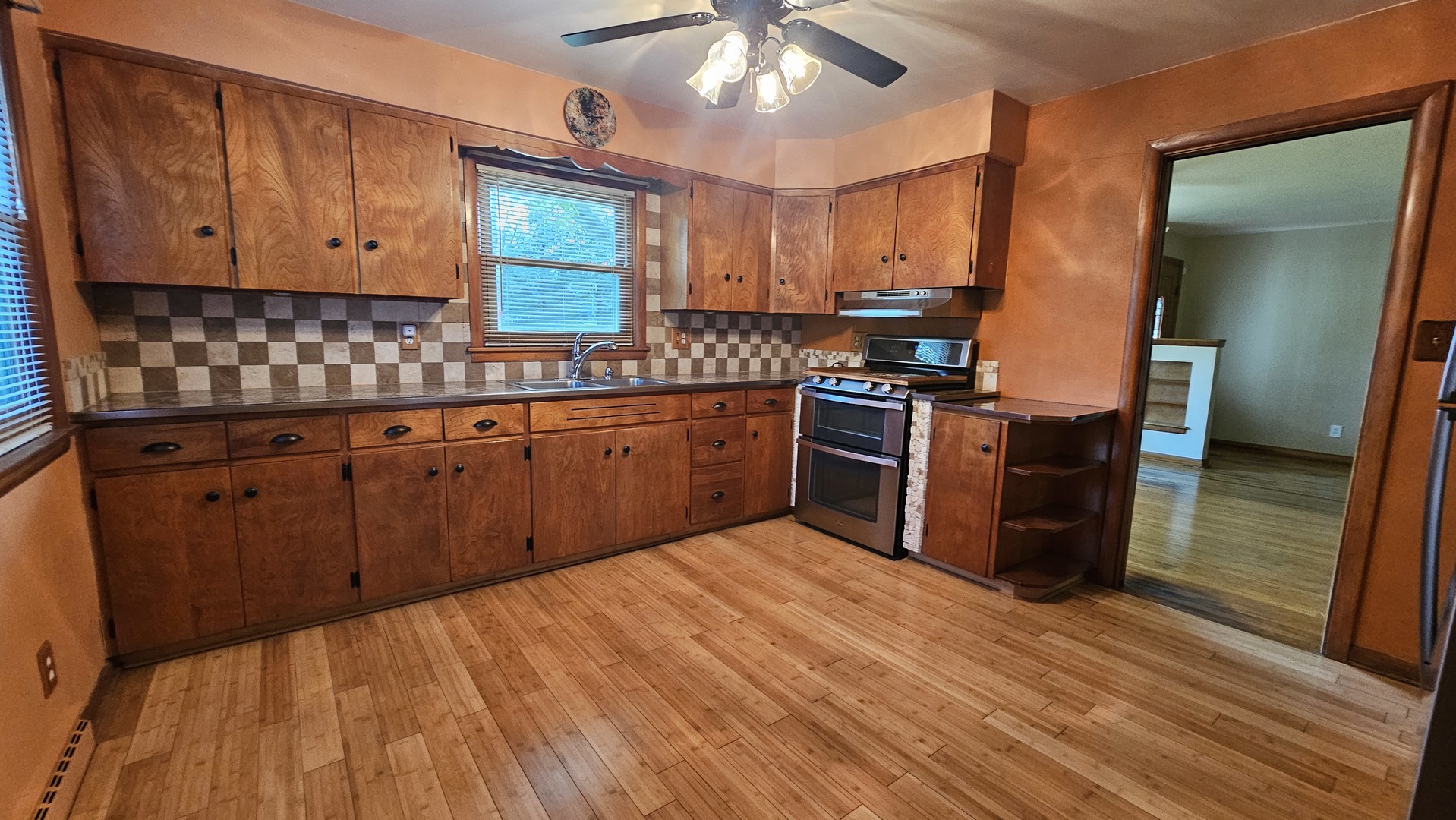 13658 East Flagg Road Rochelle, IL 61068 - Photo 31 of 65 a kitchen with stainless steel appliances granite countertop a stove a sink dishwasher and a refrigerator