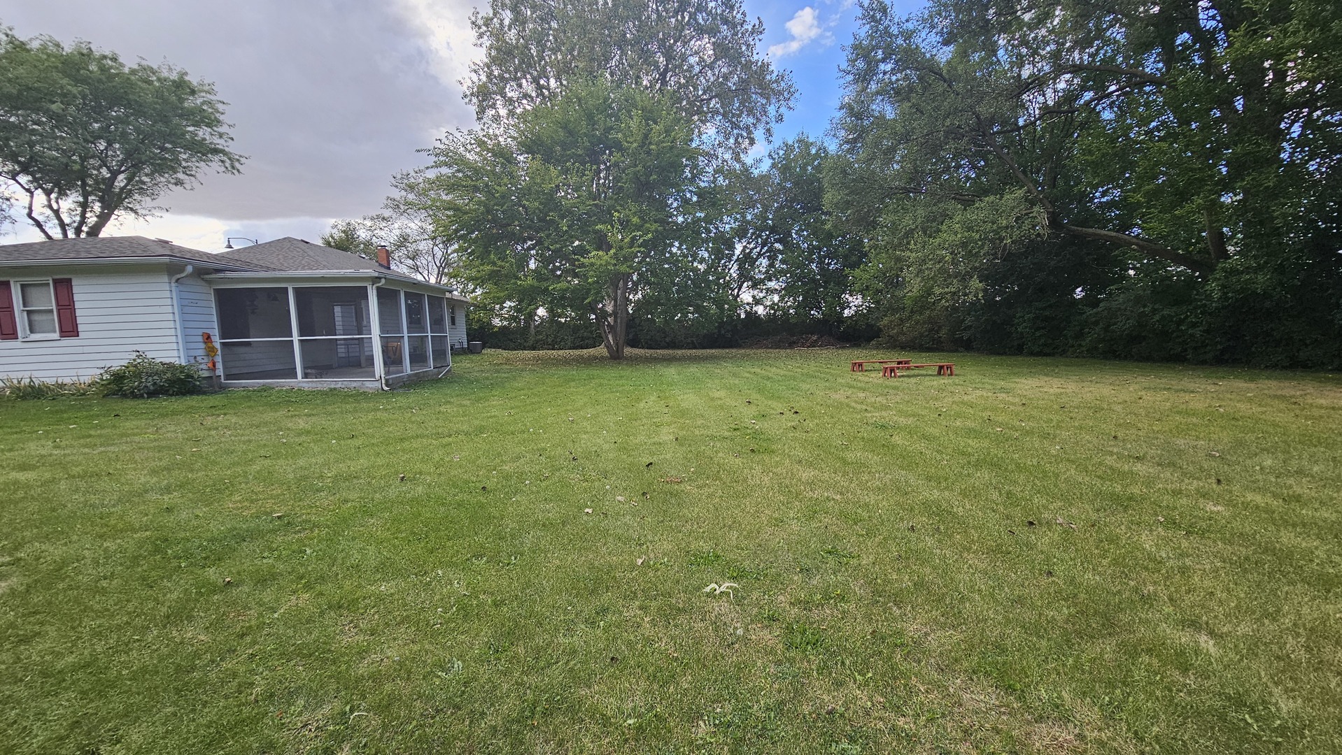 13658 East Flagg Road Rochelle, IL 61068 - Photo 61 of 65 a view of a house with a yard