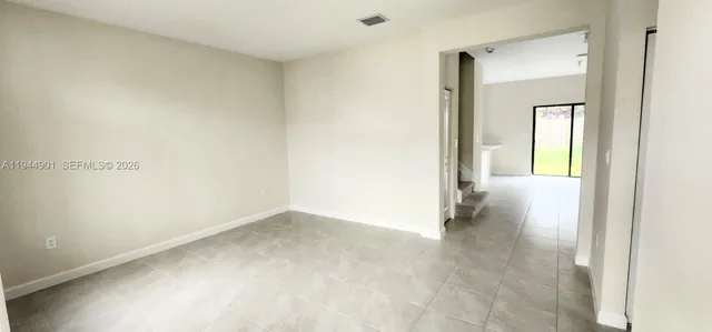 an empty room with windows