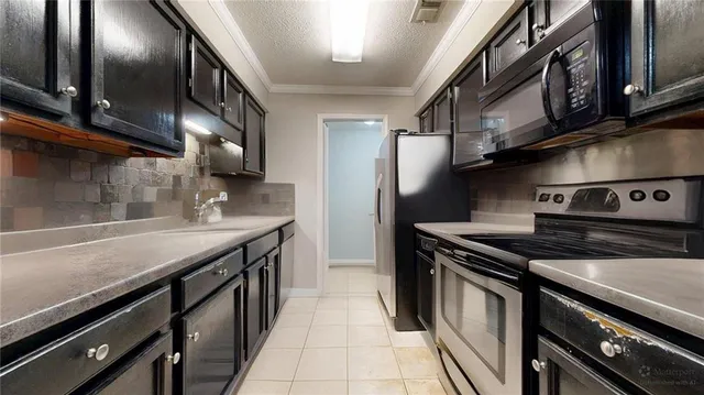 a view of livingroom with an empty space and a window