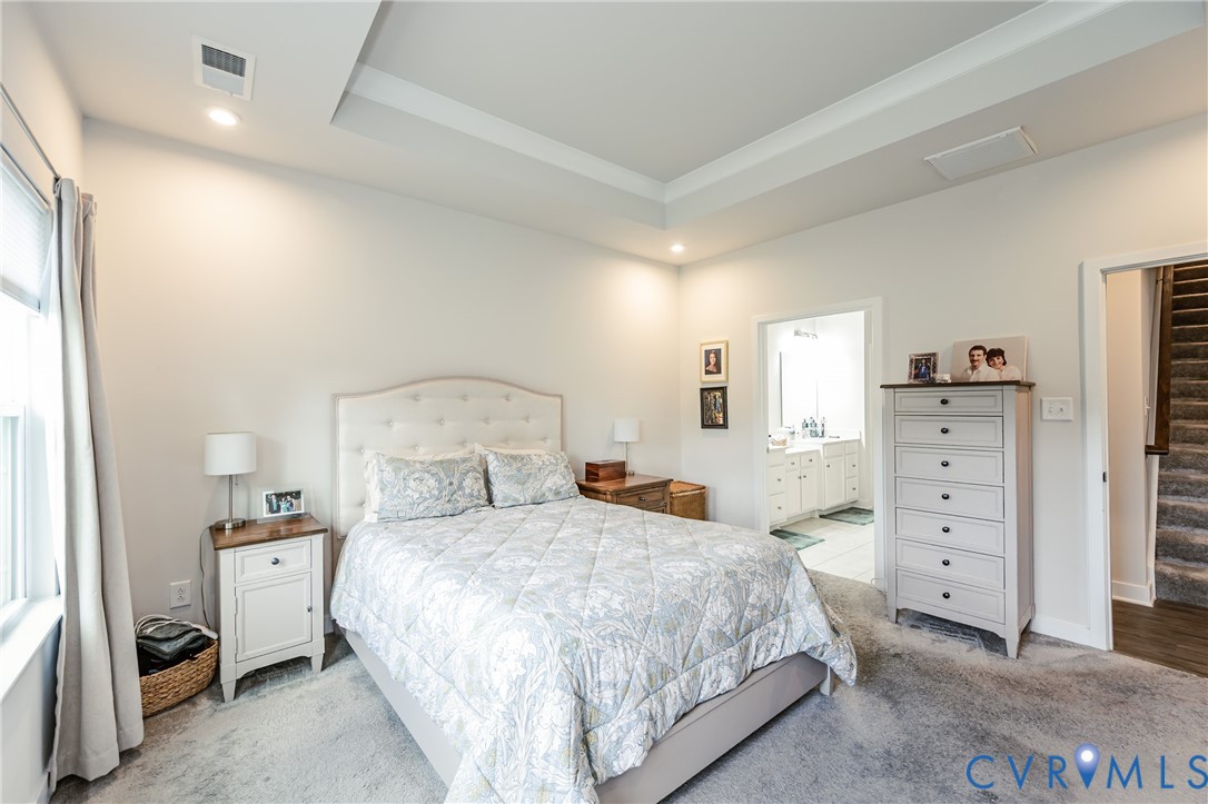 9073 Spring Green Loop Mechanicsville, VA 23116 - Photo 18 of 31 a bedroom with a bed and a window