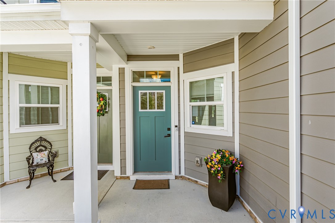 9073 Spring Green Loop Mechanicsville, VA 23116 - Photo 5 of 31 a view of a entryway door front of a house
