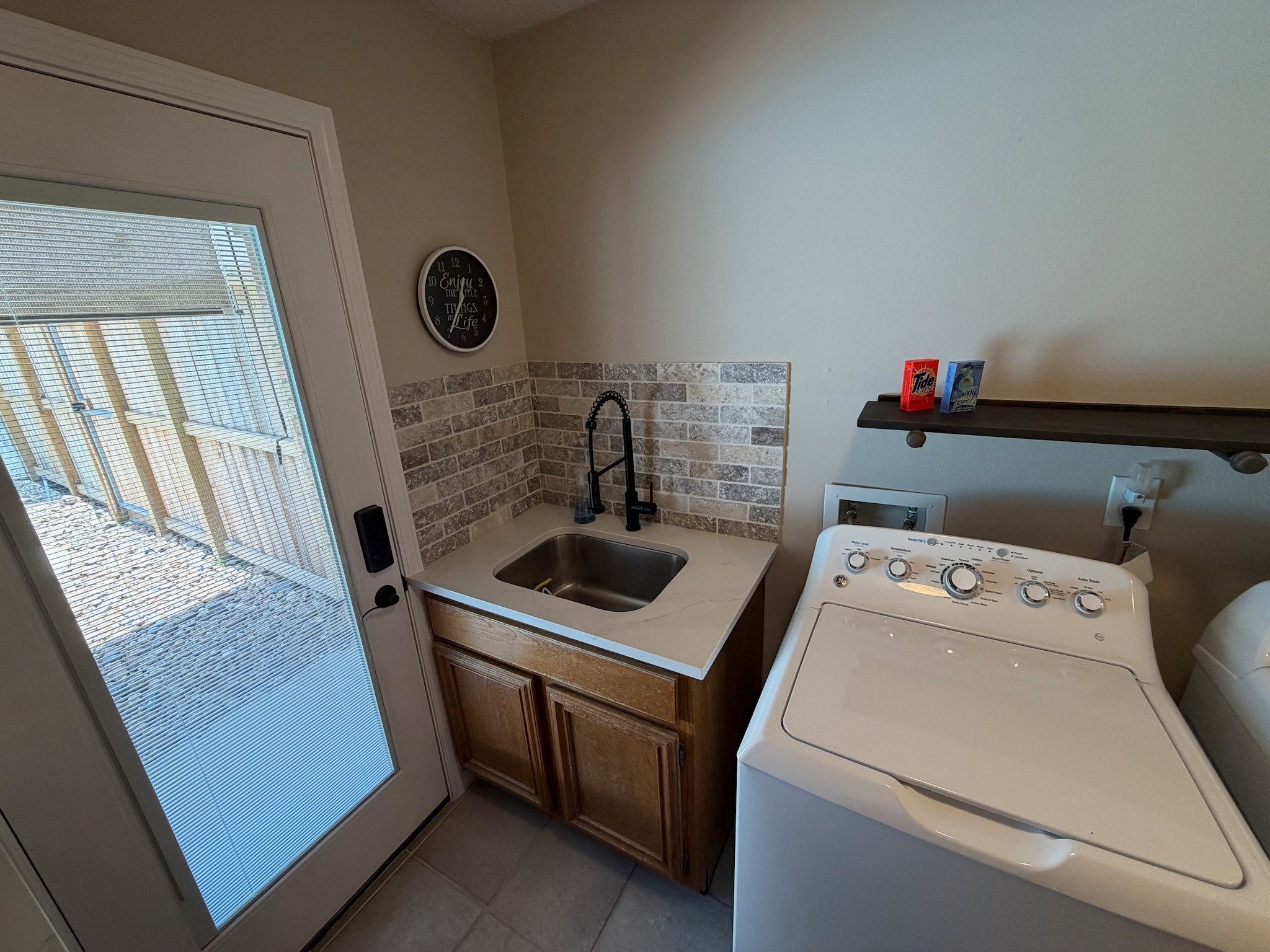 2326 Streamcrest Lane Sugar Land, TX 77479 - Photo 20 of 42 Utility room stainless steel sink.