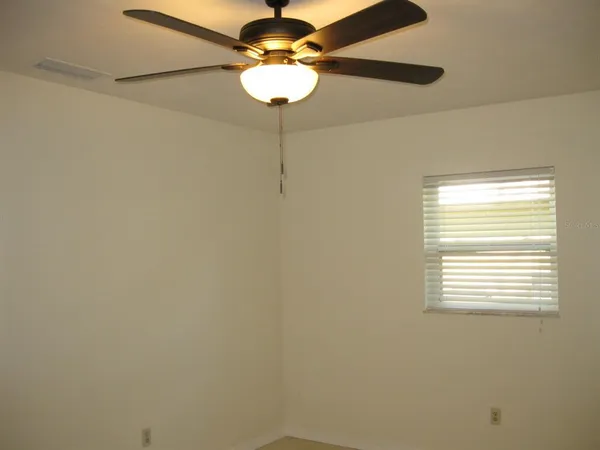 a window in a small bathroom