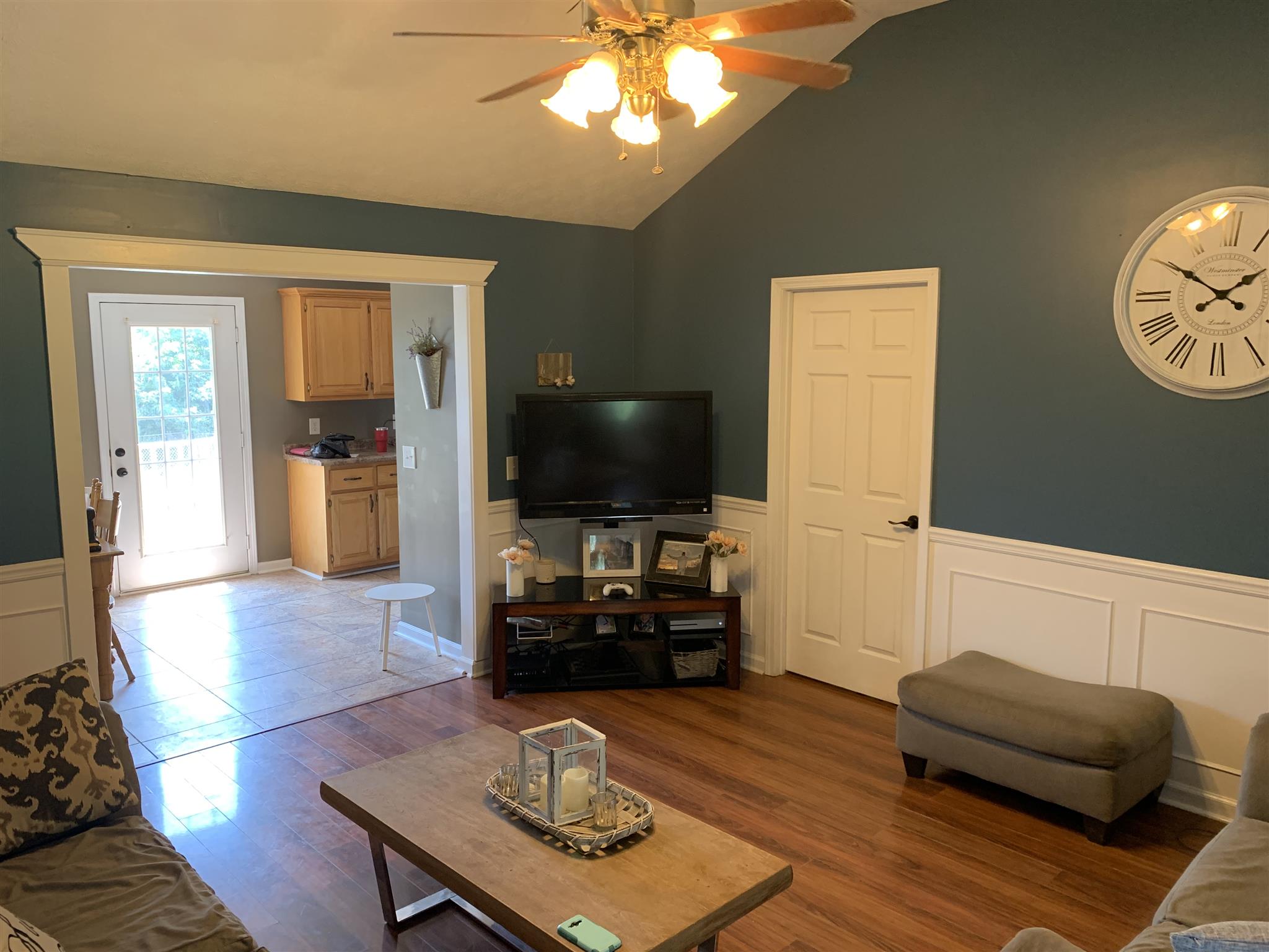 373 North Harris Road Portland, TN 37148 - Photo 6 of 15 Living room with a tall ceiling and wainscoting