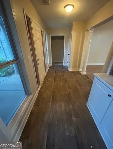 a view of a livingroom with a staircase