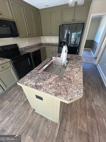 a view of empty room with windows