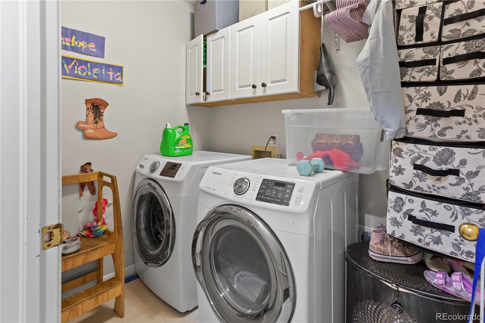 2212 Hyacinth Road Littleton, CO 80129 - Photo 19 of 44 a utility room with dryer and washer