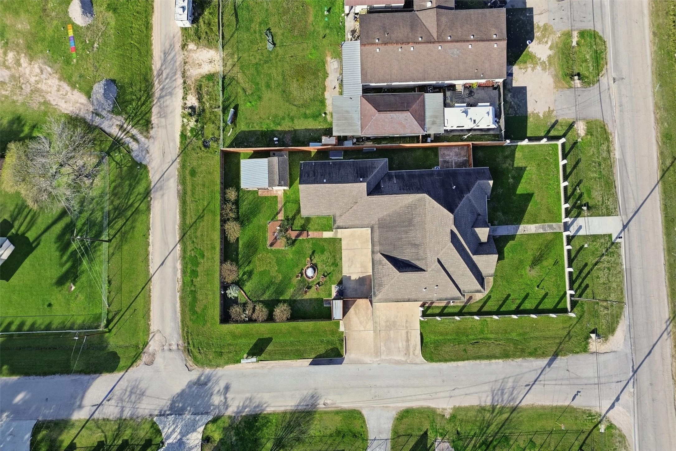14103 Smith Road Humble, TX 77396 - Photo 31 of 39 an aerial view of a house with garden space and street view