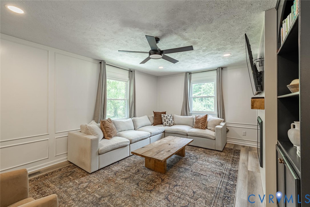 12397 New Market Mill Road Beaverdam, VA 23015 - Photo 3 of 44 a living room with furniture and a flat screen tv