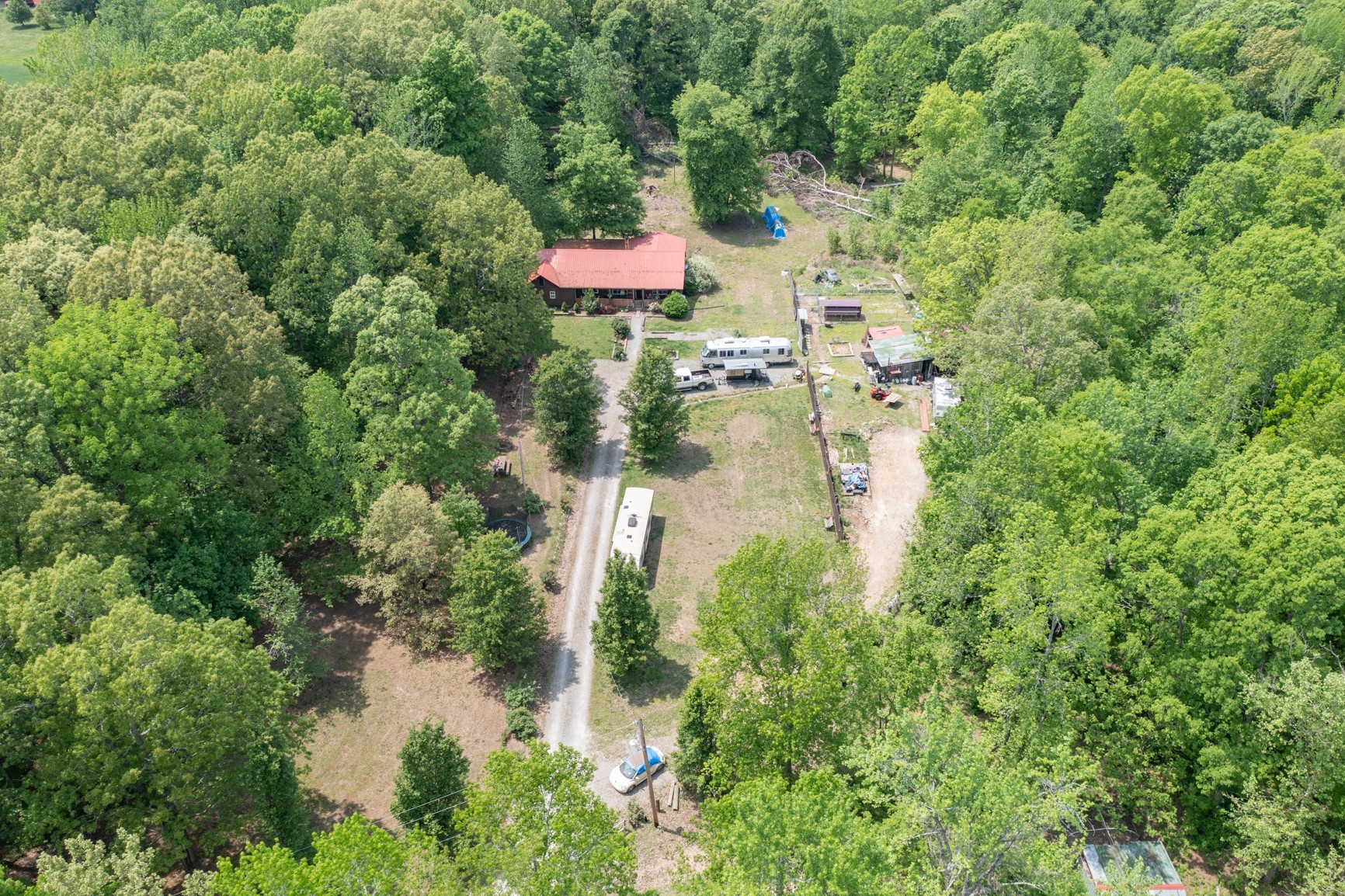 2126 Old Chambliss Road Pleasant View, TN 37146 - Photo 12 of 15 a backyard of a house with a yard and fountain