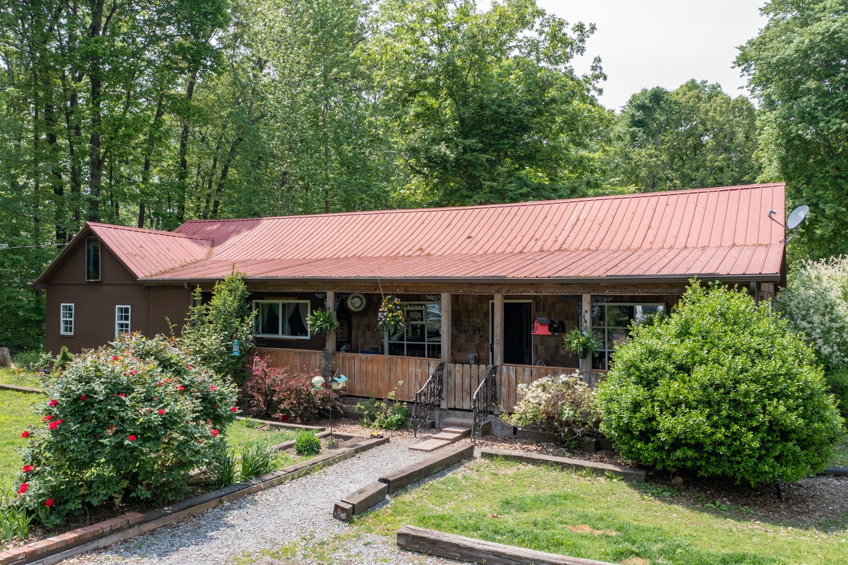 2126 Old Chambliss Road Pleasant View, TN 37146 - Photo 6 of 15 a backyard of a house with yard and outdoor seating
