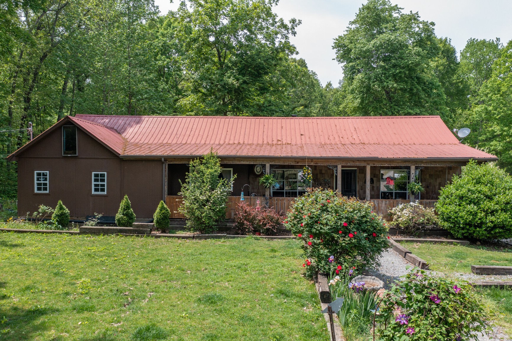 2126 Old Chambliss Road Pleasant View, TN 37146 - Photo 7 of 15 a view of a house with garden and yard