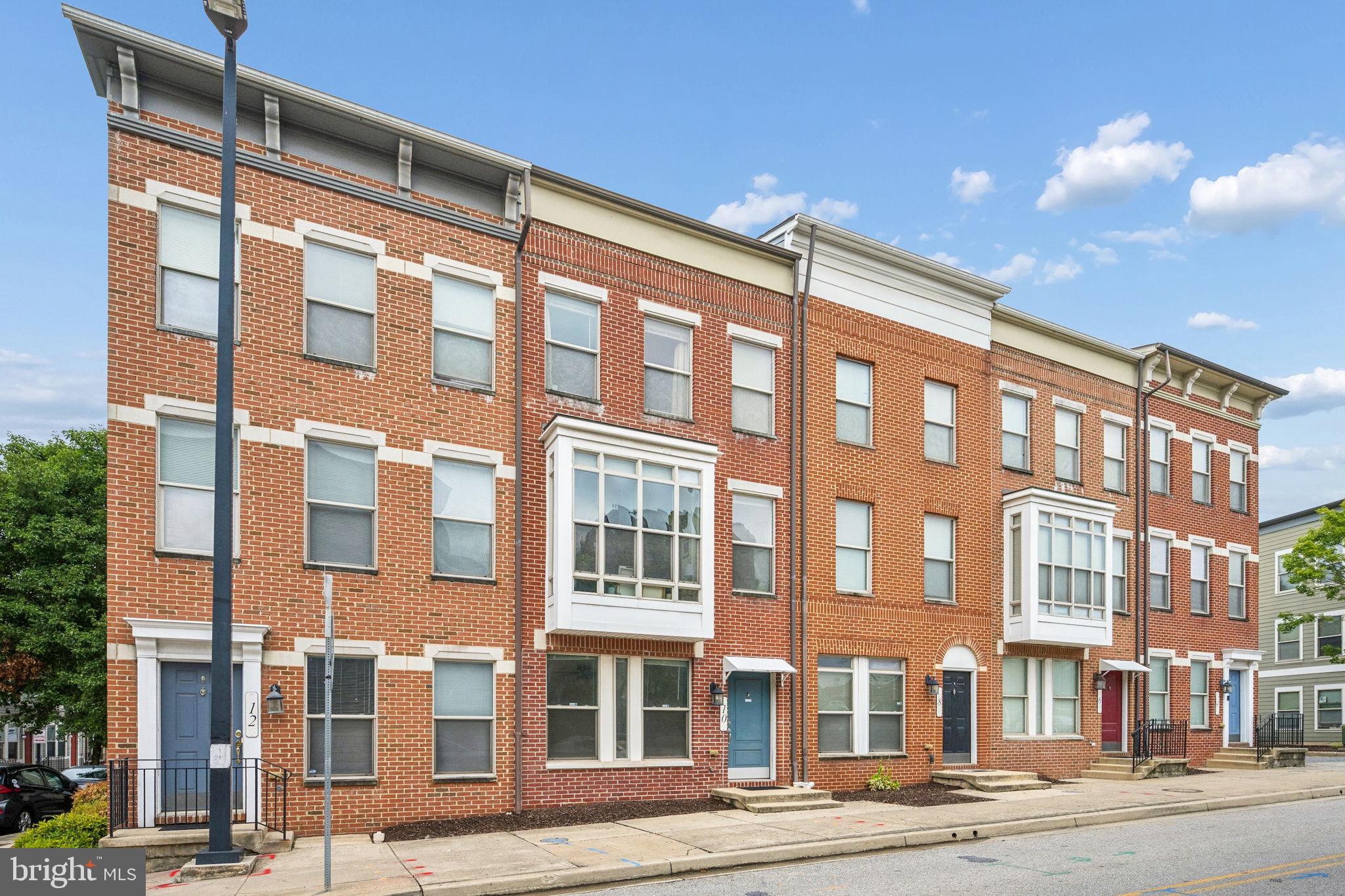 10 South Exeter Street Baltimore, MD 21202 - Photo 1 of 55 Charming brick townhomes in a row.