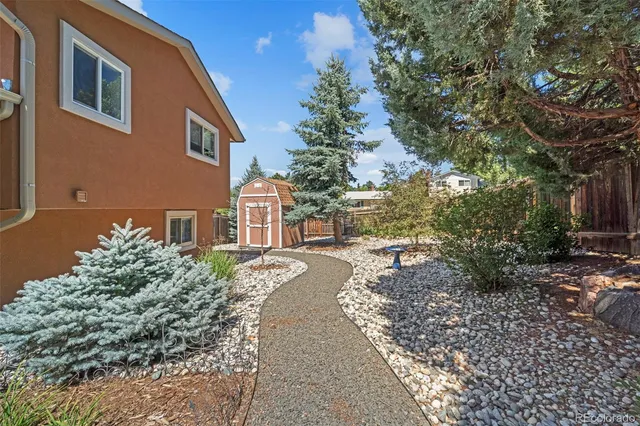 a house view with a outdoor space