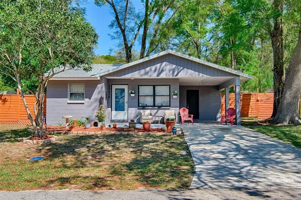 a front view of a house with an outdoor space