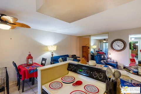 a living room with lots of furniture and window