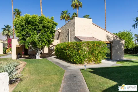 a view of a back yard of the house