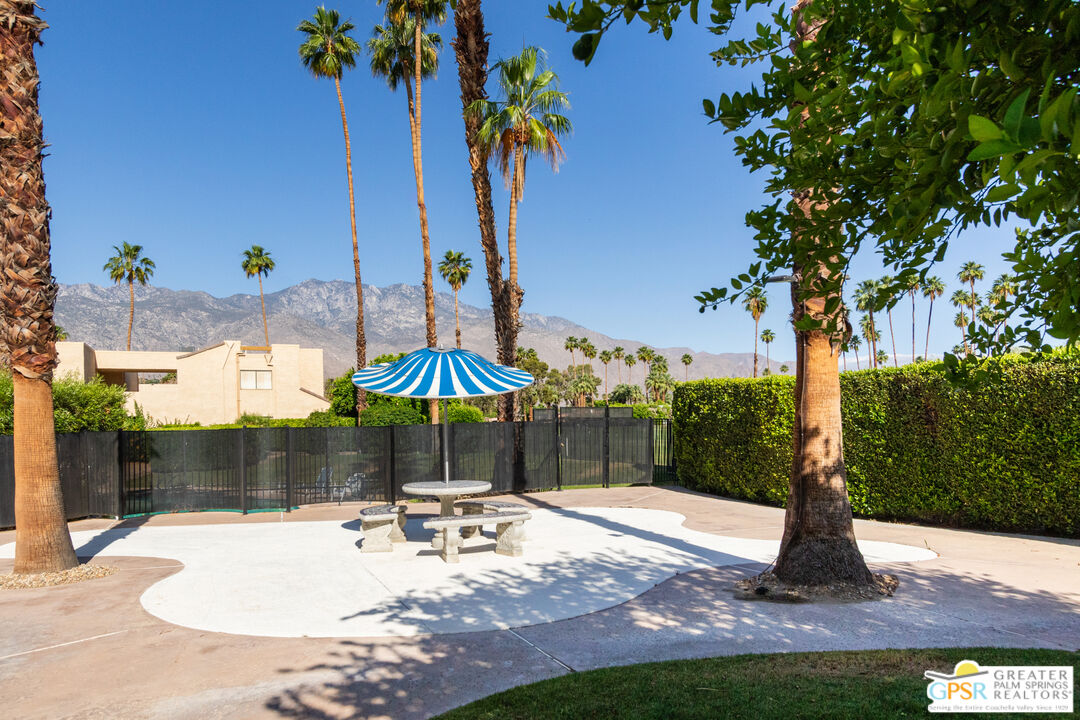 5300 East Waverly Drive, Unit C13 Palm Springs, CA 92264 - Photo 26 of 32 a park view with a sitting space