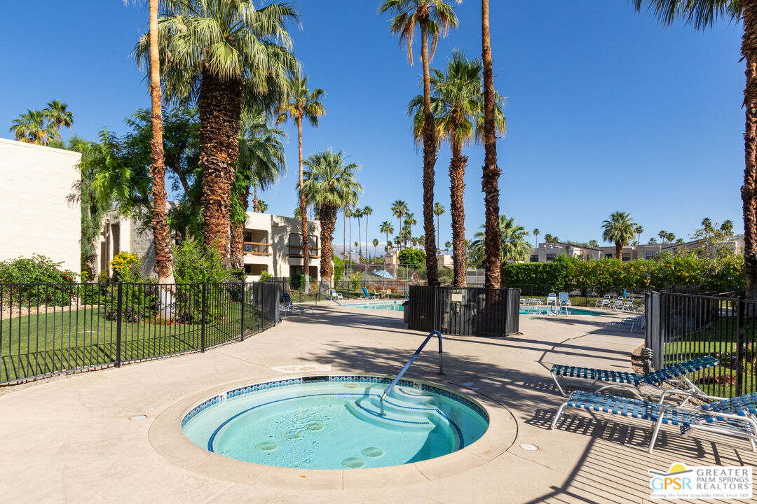 5300 East Waverly Drive, Unit C13 Palm Springs, CA 92264 - Photo 31 of 32 a house view with a garden space