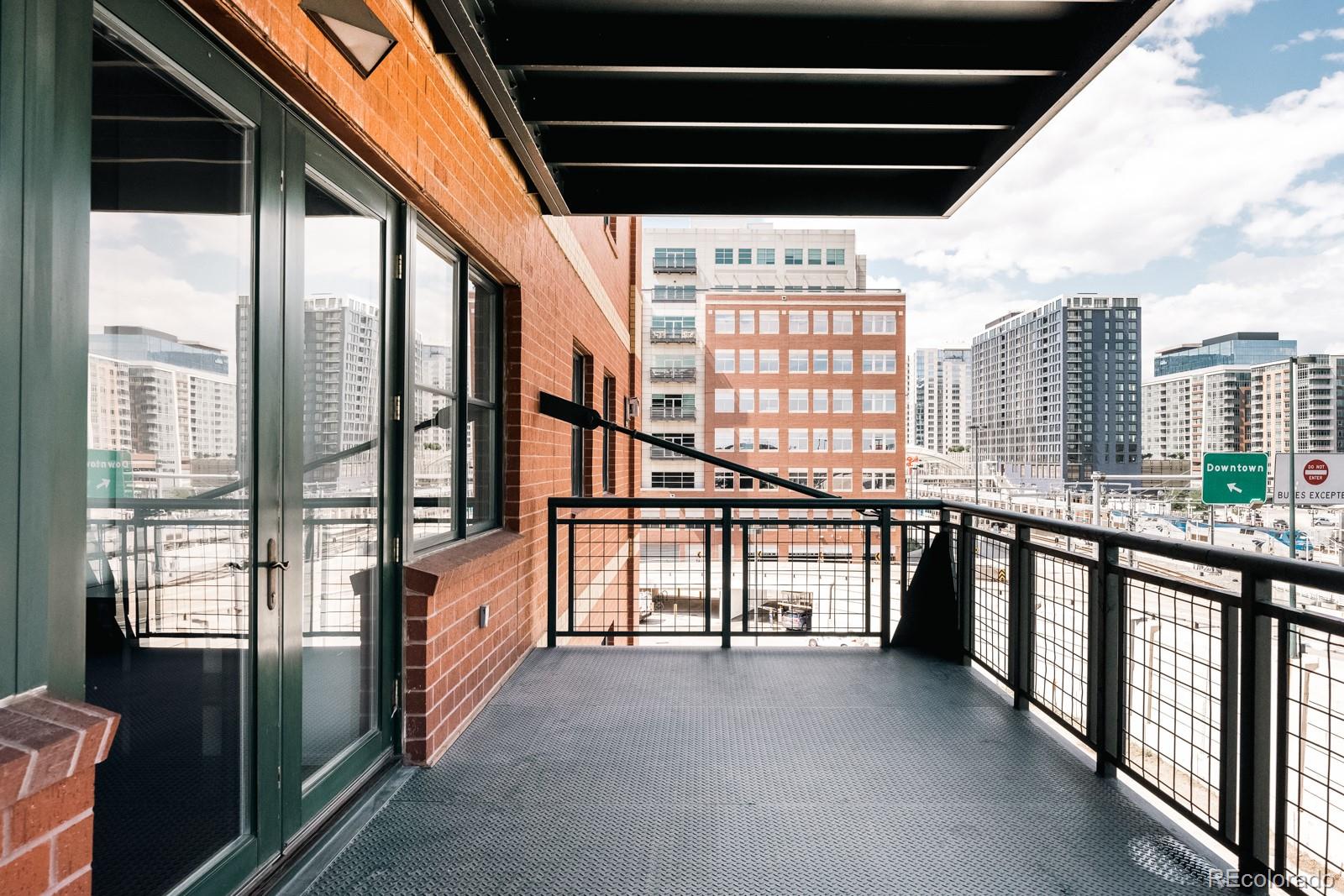 1735 19th Street, Unit 4A Denver, CO 80202 - Photo 7 of 25 a view of a city from a balcony