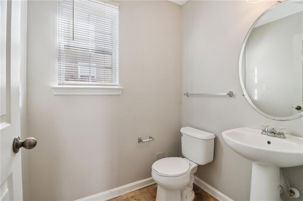 3118 Farmstead Court Grayson, GA 30017 - Photo 22 of 55 a bathroom with a sink and a toilet