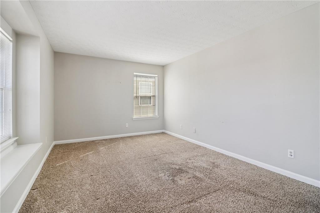 3118 Farmstead Court Grayson, GA 30017 - Photo 28 of 55 an empty room with windows