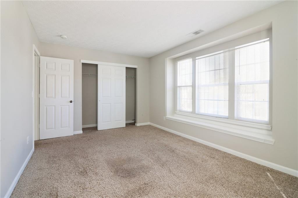 3118 Farmstead Court Grayson, GA 30017 - Photo 30 of 55 an empty room with windows