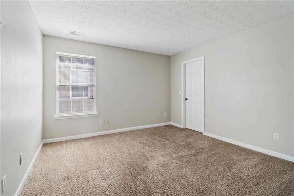 3118 Farmstead Court Grayson, GA 30017 - Photo 31 of 55 a view of an empty room with a window