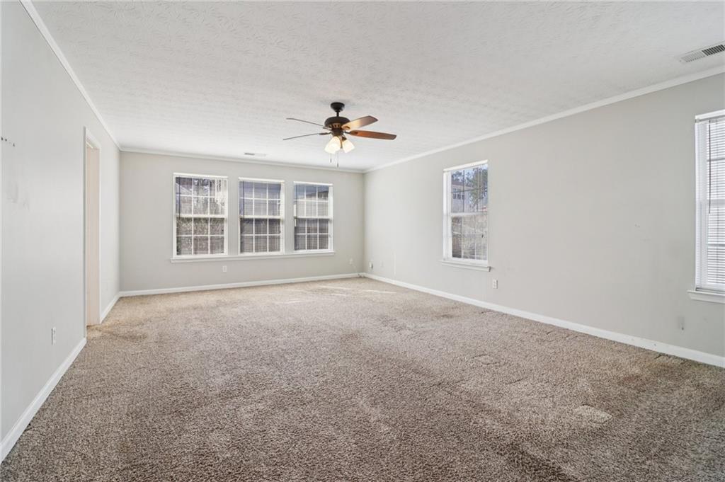 3118 Farmstead Court Grayson, GA 30017 - Photo 37 of 55 a view of empty room with windows