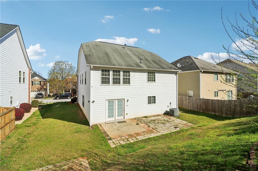 3118 Farmstead Court Grayson, GA 30017 - Photo 55 of 55 a front view of a house with garden